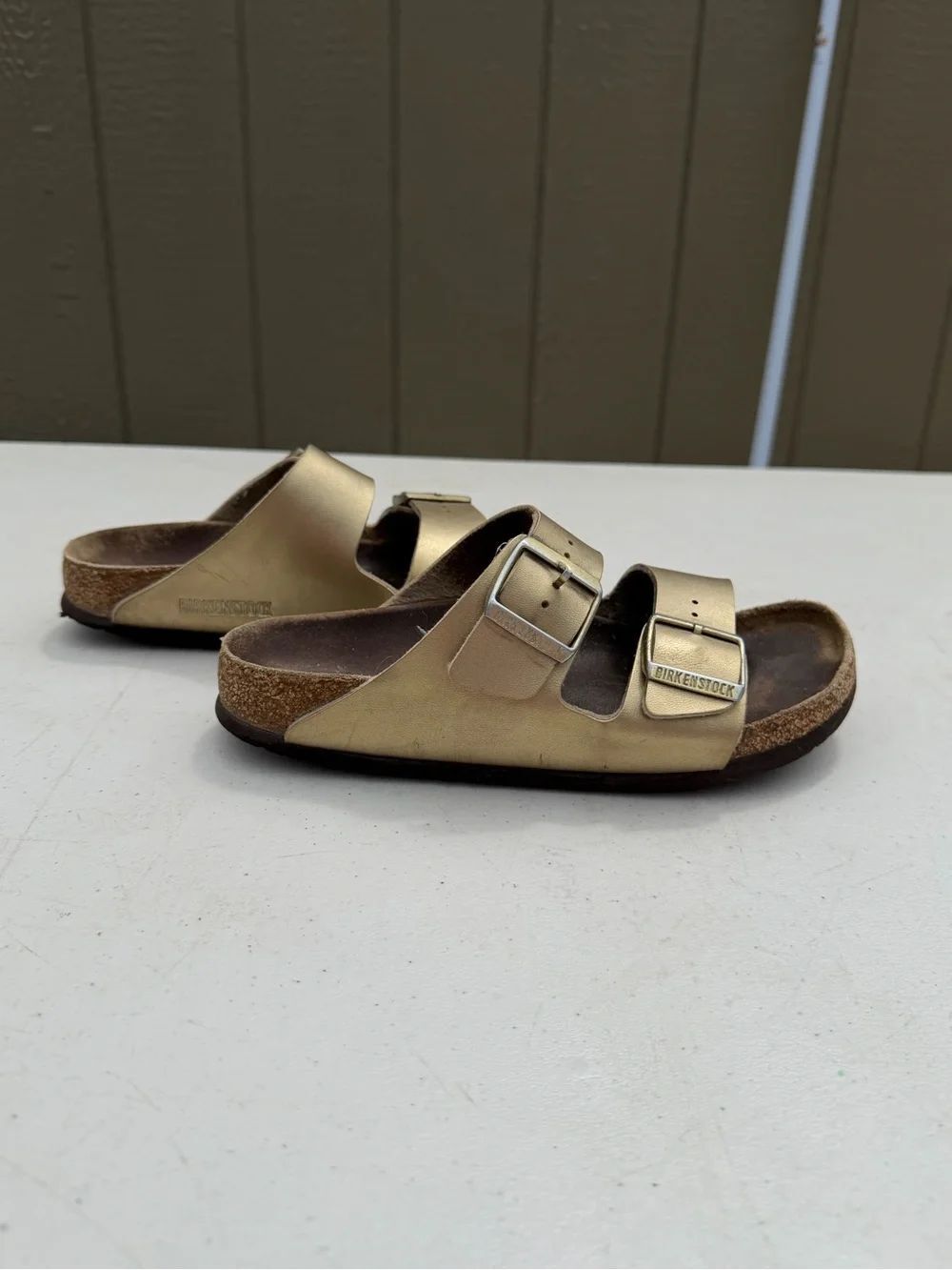 Birkenstock  Two-Strap Sandals in Metallic Gold